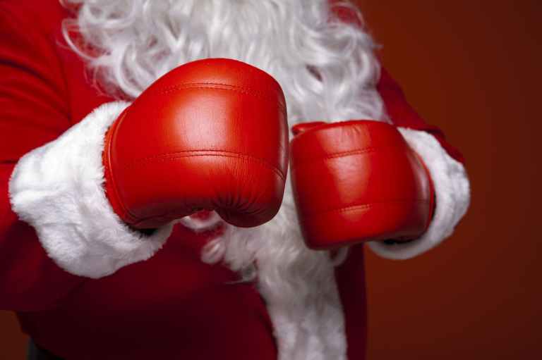 santa claus wearing boxing gloves